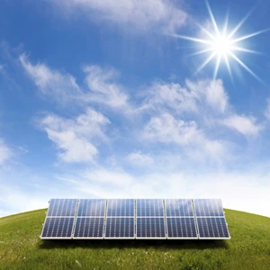 solar panel on a grass hill